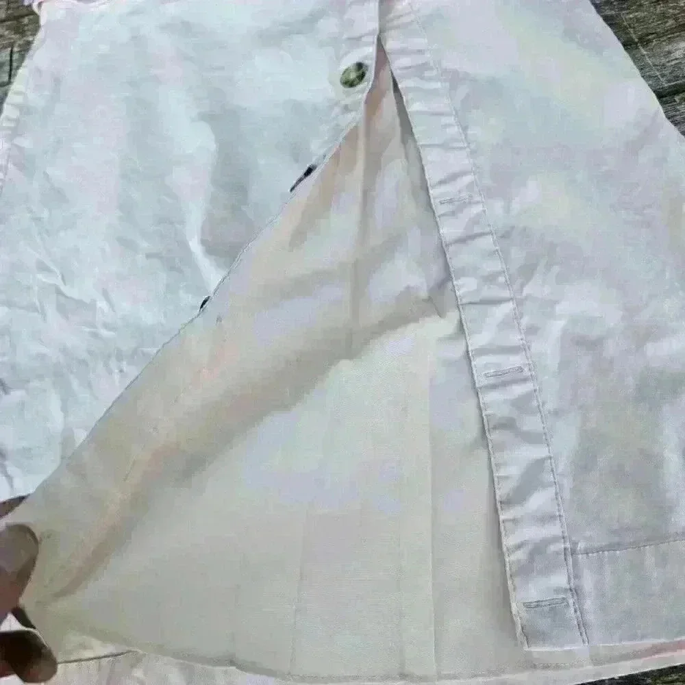 Super cute anthropology light pink linen skirt with faux thigh slit size 8